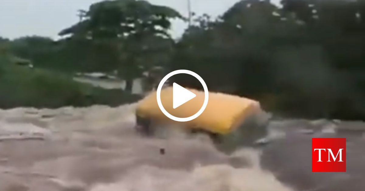 bus overturned in flood waters